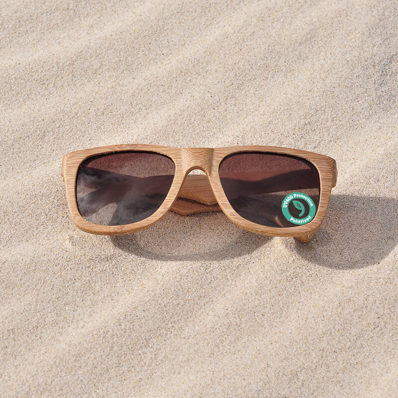 Wooden Sunglasses by Grown on a wood table with keys